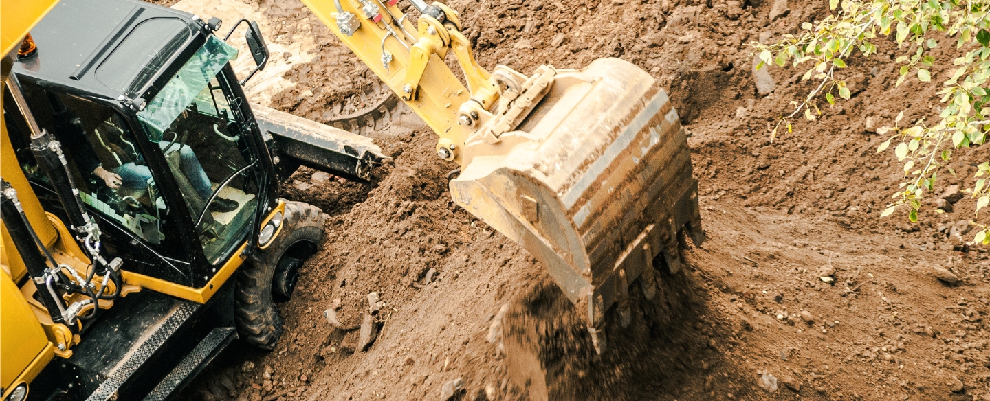 excavator digging dirt courtland ms